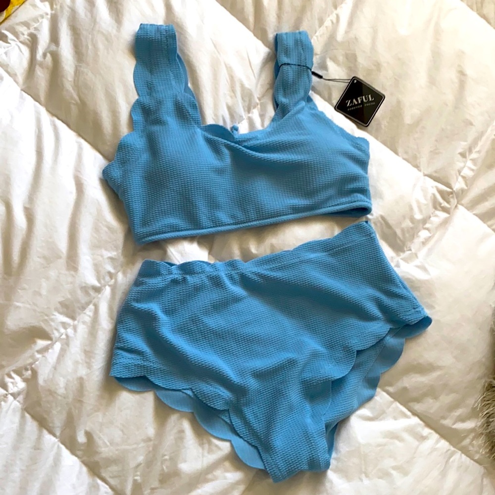 Two piece high waisted bathing suite.